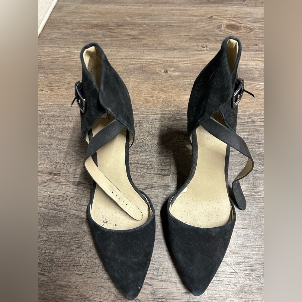 Black closed toe heels, size 9.5